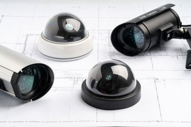 Premium Photo _ Cctv security online camera with house plan